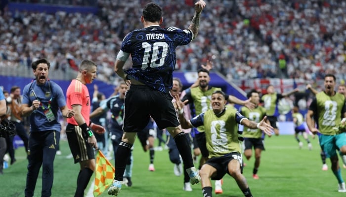 Argentinas forward #10 Lionel Messi celebrates after winning the 2026 World Cup football tournament semi-final match between England and Argentina at the Atlanta Stadium in Atlanta on July 15, 2026. — AFP