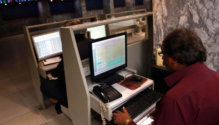 Brokers are busy in trading at Pakistan Stock Exchange (PSX) in Karachi on Friday, April 4, 2025. — PPI