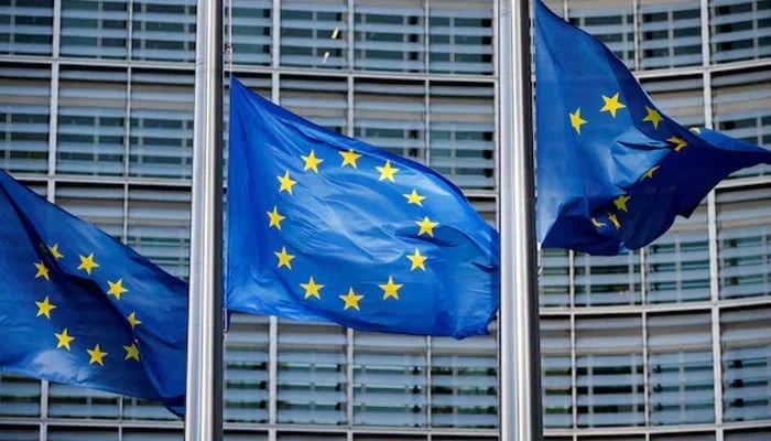 European Union flags fly outside the European Commission headquarters in Brussels, Belgium, March 1, 2023. — Reuters
