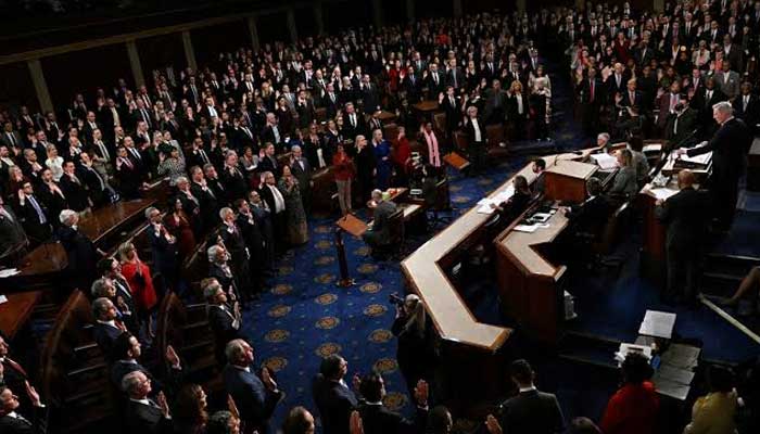 Members of the 118th Congress raise their right hands as they are sworn into office to serve in the US House of Representatives on the fourth day of Congress at the US Capitol in Washington, US, January 7, 2023. — Reuters
