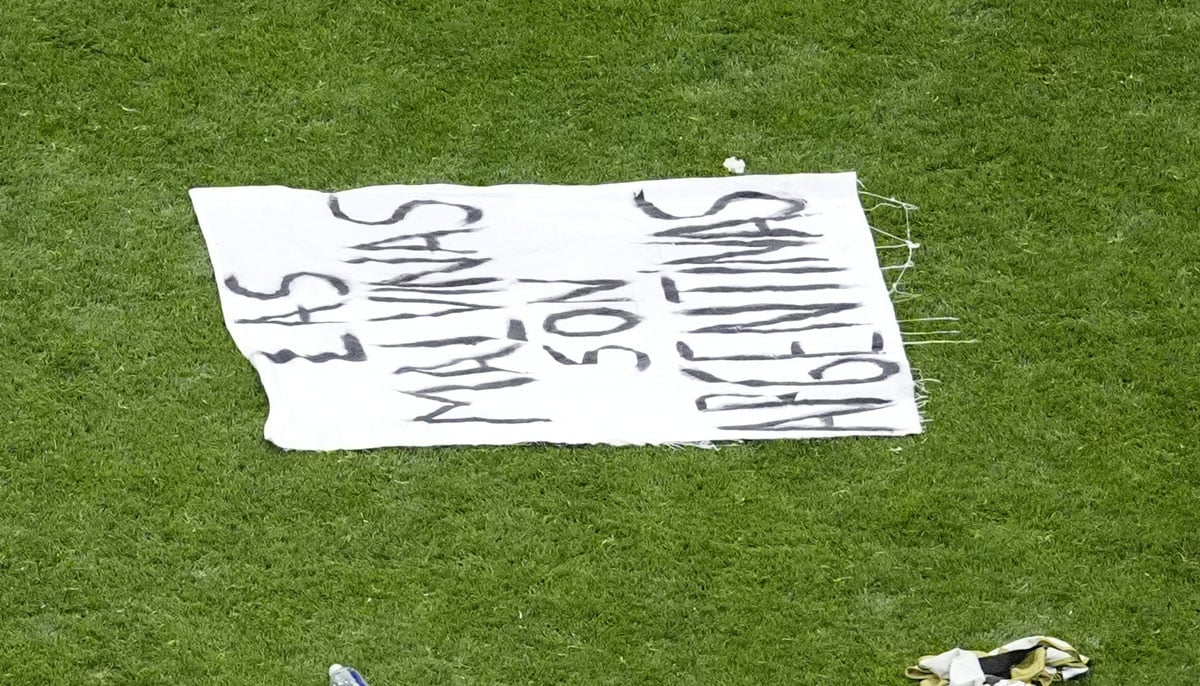 A banner displaying a message referencing The Falkland Islands is seen on the pitch after Semi Final, England v Argentina in Atlanta Stadium, Atlanta, Georgia, US on July 15, 2026. — Reuters
