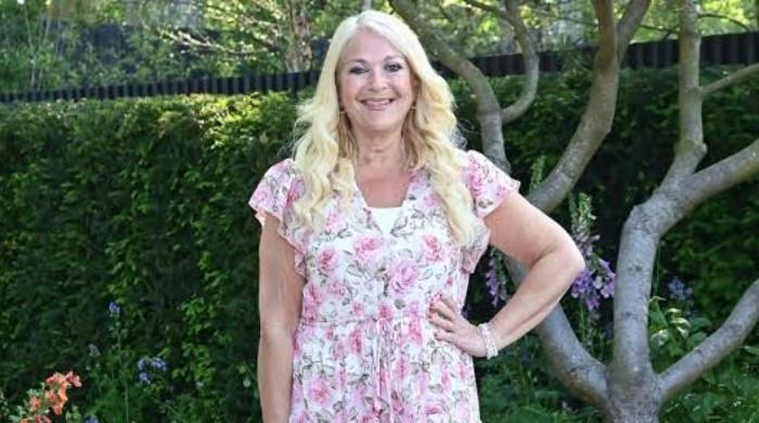 Vanessa Feltz smiles through TV setback with sunny family outing
