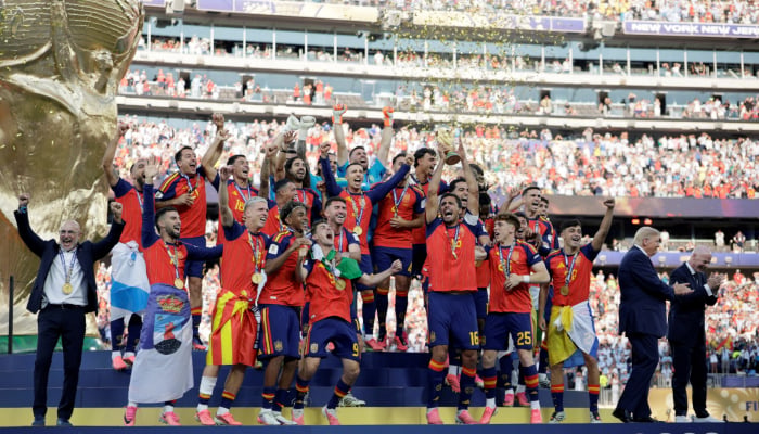 US President Donald Trump and FIFA President Gianni Infantino applaud after presenting the FIFA World Cup trophy to Spain after its victory in the 2026 World Cup final at New York New Jersey Stadium in East Rutherford, New Jersey, US, July 19, 2026. — Reuters