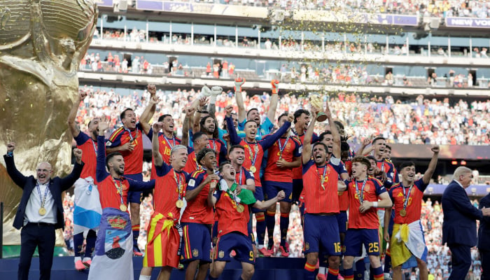US President Donald Trump and Fifa President Gianni Infantino applaud after presenting the World Cup trophy to Spain after its victory in the 2026 World Cup final at New York New Jersey Stadium in East Rutherford, New Jersey, US, July 19, 2026. — Reuters