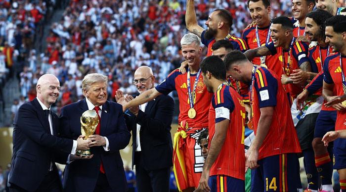 Trump mocked for lingering on stage during Spain's trophy celebration