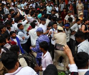Police cane supporters of India's cockroach movement as thousands gather for march
