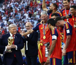 Trump mocked for lingering on stage during Spain's trophy celebration
