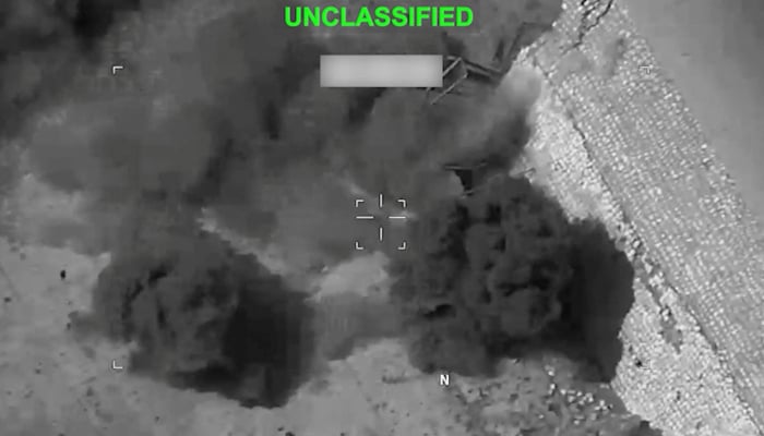 Smoke rises from an explosion at an unknown location, during what US Central Command says are strikes on Iran, in this screengrab taken from a handout video released on July 20, 2026. — Reuters