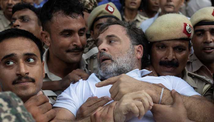 Indian opposition leader Rahul Gandhi is detained by police during a sit-in protest outside Prime Minister Narendra Modis residence, demanding accountability for police action against students, in New Delhi, India, July 21, 2026. — Reuters