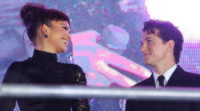 Tom Holland can't take his eyes off Zendaya at ‘Spider-Man' event