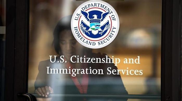 US judge blocks Trump administration from stripping immigrants of work permits