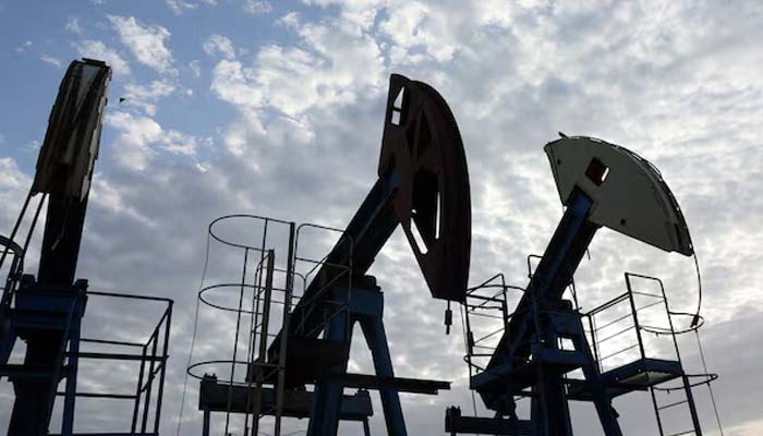 Birds fly over pump jacks at the Airankol oil field operated by Caspiy Neft in the Atyrau region, Kazakhstan, April 20, 2026. — Reuters