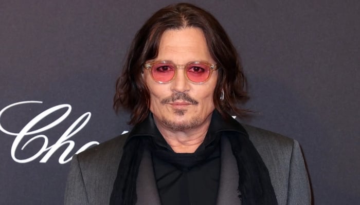 Johnny Depp debuts first look as Ebenezer Scrooge at Comic-Con: Pictures inside