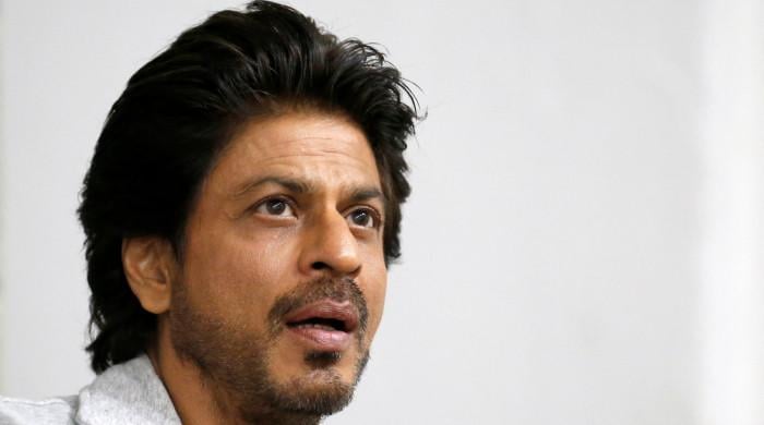 Why did Shah Rukh Khan's father leave Pakistan?