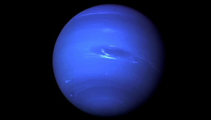 The planet Neptune, including its Great Dark Spot — a storm in the atmosphere and the bright, light-blue smudge of clouds that accompanies the storm — is seen in this image taken by the Nasa spacecraft Voyager 2 less than five days before its closest approach of the planet on August 25, 1989. — Reuters