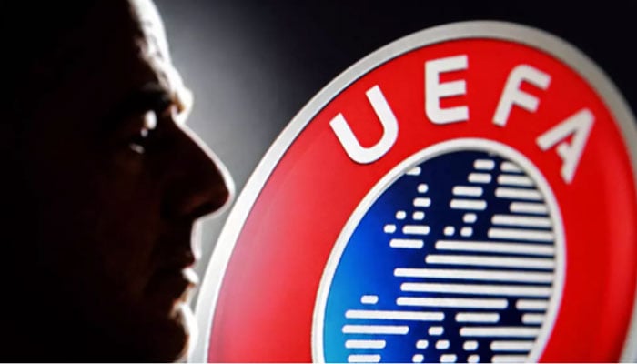 A silhouette depicting Fifa President Gianni Infantino is seen next to a Uefa logo in this illustration taken July 30, 2026. — Reuters