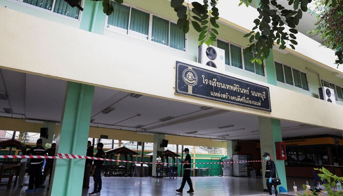 Forensic police officers examine the building of Debsirin Nonthaburi School, where the shooting incident took place, in Bang Kruai district in Nonthaburi province on the outskirts of Bangkok, Thailand, August 7, 2026.— Reuters