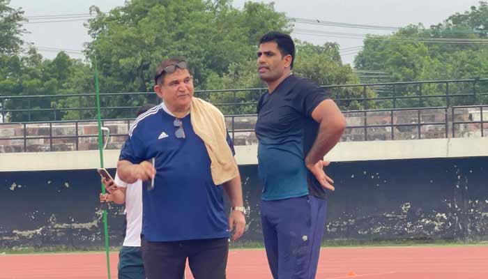 Olympic gold medallist Arshad Nadeem (right) trains with coach Salman Butt at Punjab Stadium in Lahore on August 12, 2026. — Reporter
