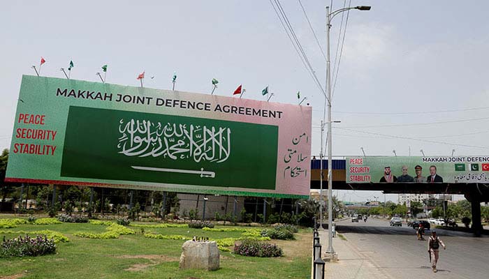 Billboards display portraits of Saudi Crown Prince Mohammed bin Salman, Prime Minister  Shehbaz Sharif, Chief of Defence Forces Asim Munir, and Turkish President  Erdogan in Karachi, August 9, 2026. — Reuters