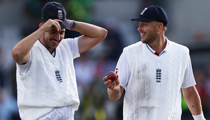 Englands Josh Tongue celebrates with teammate Ollie Robinson after dismissing Pakistans Mohammad Abbas to complete his five-wicket haul during the first Test at Headingley, Leeds, Britain, August 19, 2026. — Reuters