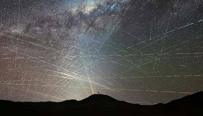 Satellite trails streak across the night sky above Chiles Atacama Desert in this composite image from a time-lapse video taken on October 15, 2025. — Reuters
