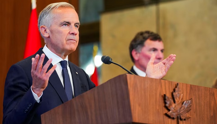 Canada’s Prime Minister Mark Carney speaks with the news media after he suspended trade negotiations with the United States, in Ottawa, Ontario, Canada, August 22, 2026. — Reuters