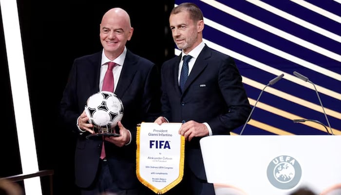 Uefa President Aleksander Ceferin and Fifa President Gianni Infantino pose during the 50th Ordinary Uefa Congress at Brussels Expo in Brussels, Belgium, on February 12, 2026. — Reuters