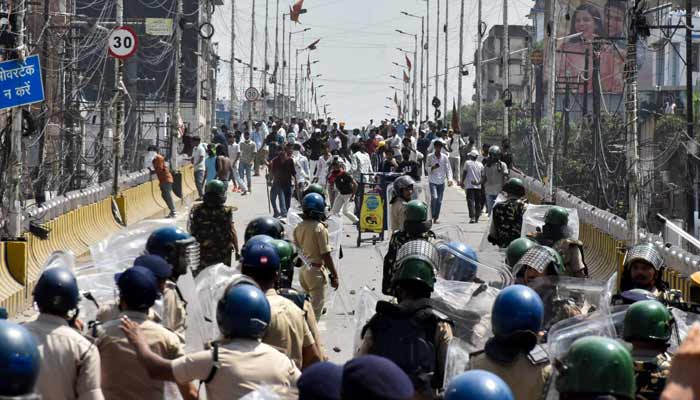 Protesters engage in a clash with policemen during a Bihar Bandh call for demanding the resignation of Education Minister Dharmendra Pradhan over National Eligibility cum Entrance Test (NEET) examination paper leaks, in Patna, India, July 25, 2026.— Reuters