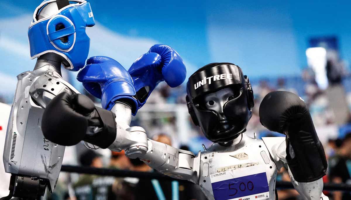 Humanoid robots by Unitree Robotics compete in the 80 kg class kickboxing quarterfinals during the 2026 World Humanoid Robot Games, at the National Speed Skating Oval, in Beijing, China, on August 23.— Reuters