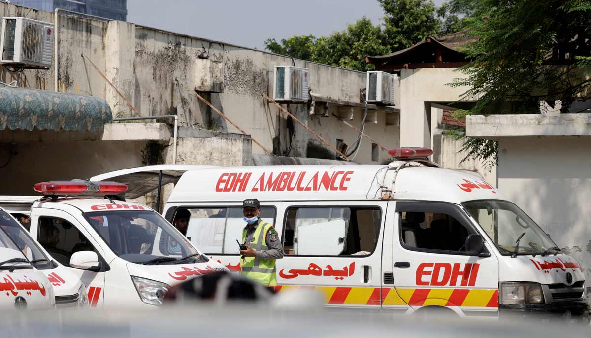Ambulances are parked outside a mortuary following a deadly fire at the Pakistan Institute of Medical Sciences hospital in Islamabad, August 26, 2026.— Reuters