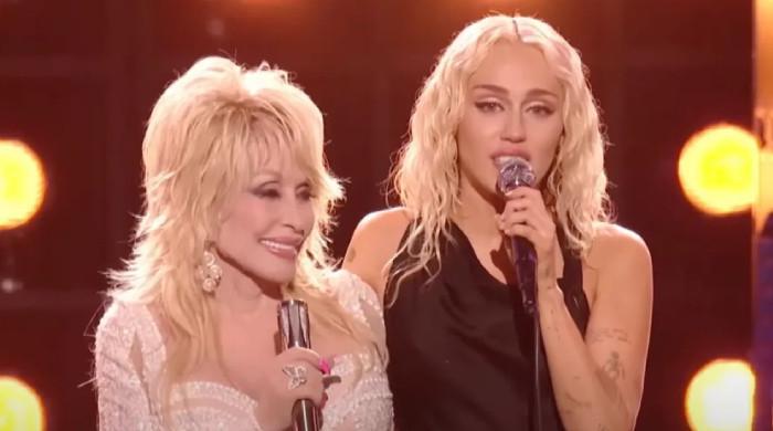 Miley Cyrus says writing a song is how 'Dolly would want' her to mourn