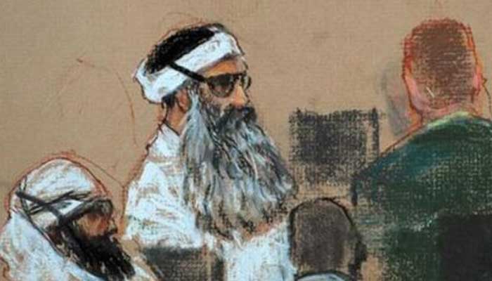 A file photo of a courtroom sketch by artist Janet Hamlin, reviewed by the US military, shows alleged September 11 co-conspirators Khalid Sheikh Mohammed (centre) and co-defendant Walid bin Attash (left) attending a pre-trial session at Guantanamo Bay US Naval Base, December 8, 2008. — Reuters
