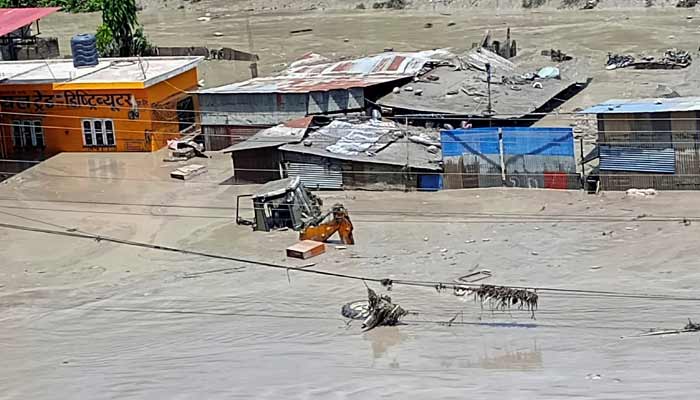 Damaged property and flooded roads following a flash flood in Galchhi in the Dhading district, Nepal, August 26, 2026.— Reuters