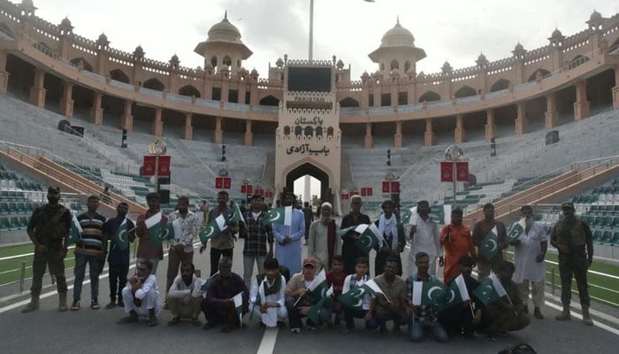 Pakistani nationals pose for a group photo after their release from Indian jails on August 29, 2026. — X/@PakinIndia
