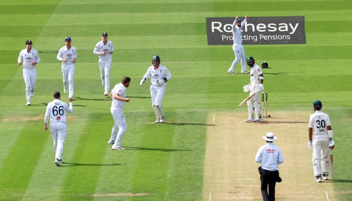 Englands Ollie Robinson celebrates after taking the wicket of Pakistans Abdullah Shafique during second Test against Pakistan at Lords Cricket Ground, London, Britain - August 30, 2026. — Reuters