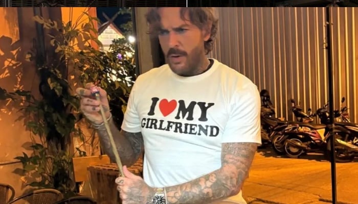 Olivia Attwood shared a snap of him wearing an I love my girlfriend T-shirt