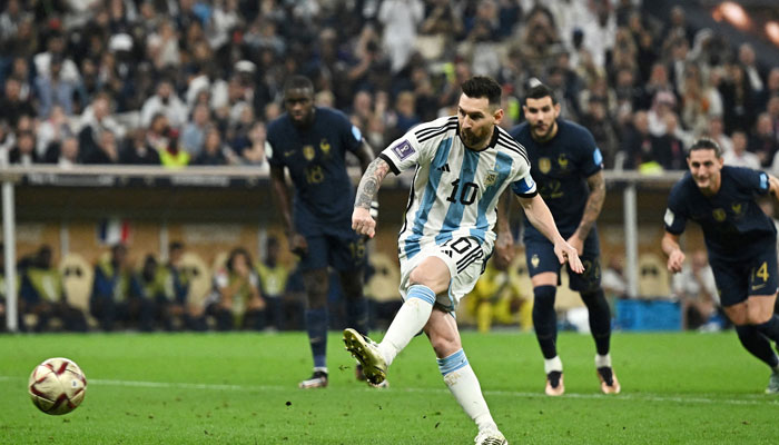 Argentina’s Lionel Messi scores his side’s first goal from the penalty spot during the 2022 FIFA World Cup final against France at Lusail Stadium in Lusail, Qatar, on December 18, 2022. — Reuters