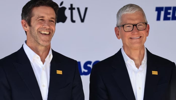 Apples CEO Tim Cook and Senior Vice President Hardware Engineering John Ternus attend the premiere of season four of the Apple TV series Ted Lasso at the Academy Museum in Los Angeles, California, US, July 27, 2026. — Reuters