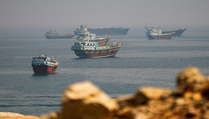 Vessels near the Strait of Hormuz, as seen from Musandam, Oman, August 31, 2026. — Reuters
