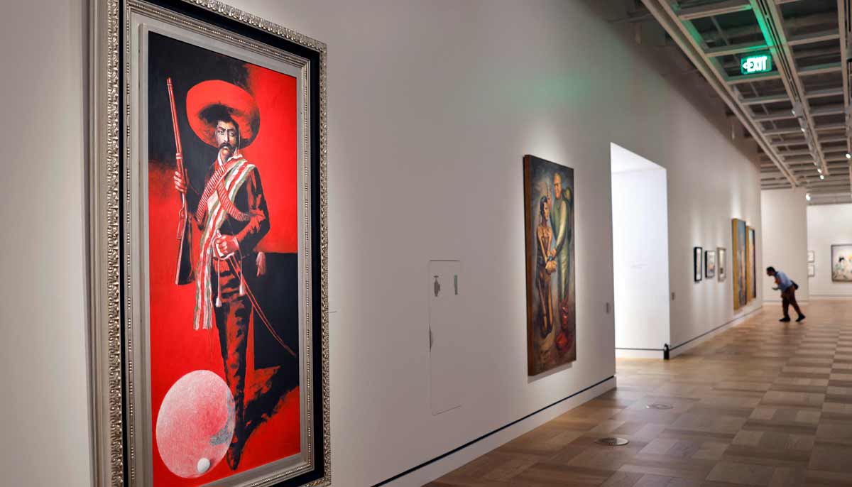 Time That Coincides by Arnoldo Coen (L) is displayed at the new Lucas Museum of Narrative Art. — AFP