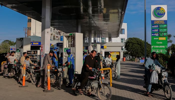 People get fuel at a petrol station in Karachi, April 3, 2026. — Reuters