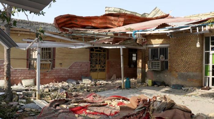 Iran buries victims of US wedding attack as Tehran fires on Kuwait