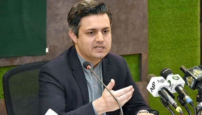 PTI leader and former federal minister Hammad Azhar addresses a press conference in this undated image. — PID/File