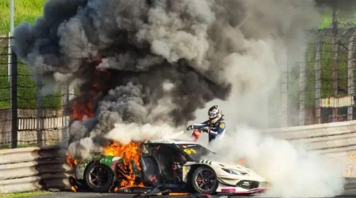 Racing driver abandons own race to pull rival from burning Ferrari at China GT