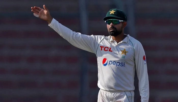 Pakistans captain Babar Azam makes field placings during third Test between Pakistan and England at National Stadium Karachi, December 18, 2022. — Reuters