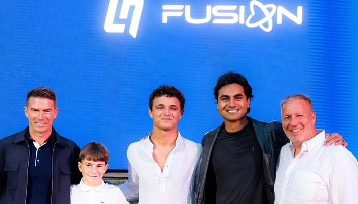 British Pakistani former Formula racing champion Enaam Ahmed (Second from Right),  Daniel Hazlewood, and Formula 1 superstar Lando Norris. — Reporter