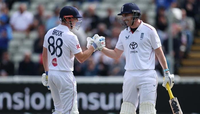 Englands Harry Brook (left) and Dan Lawrence shake hands during the second day of their third Test against Pakistan at Edgbaston in Birmingham on September 10, 2026. — Reuters