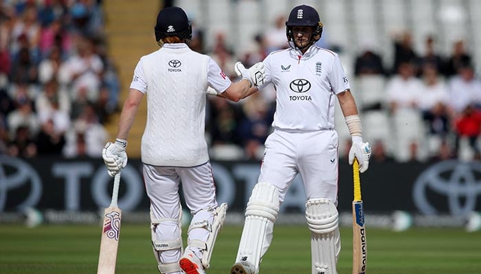 England Joe Root celebrates after reaching a hundred partnership with Jordan Cox Action in third Test against Pakistan at Edgbaston Cricket Ground, Birmingham, Britain, September 12, 2026. — Reuters