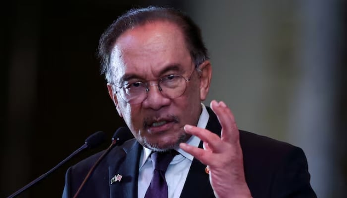Malaysias Prime Minister Anwar Ibrahim speaks as he attends a business and investment conference in Kuala Lumpur, Malaysia, October 6, 2025. — Reuters